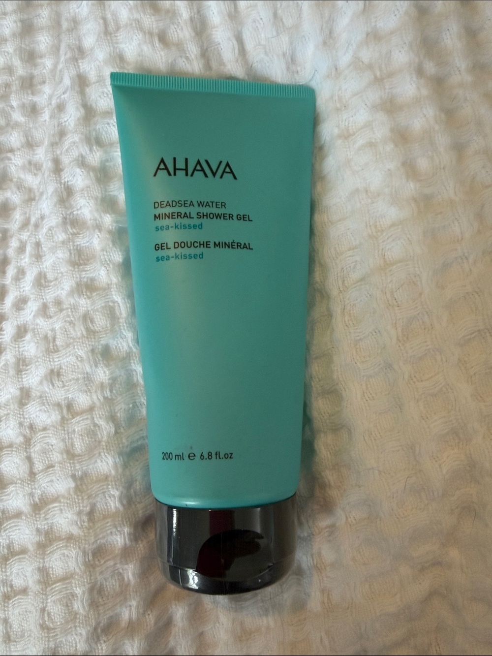 AHAVA Sea-Kissed Mineral Shower Gel — Teal Tube with Black Cap